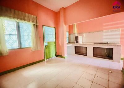 Spacious kitchen with colorful walls