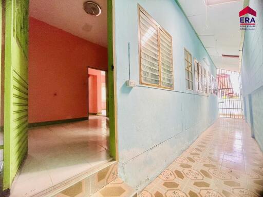 Bright hallway with adjoining rooms