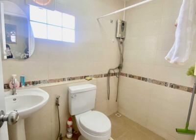 Well-lit and clean bathroom with modern fixtures