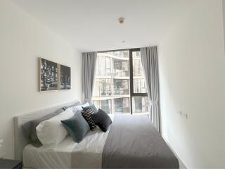 Modern bedroom with large window