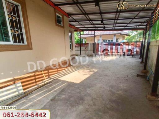 Covered carport with metal roof