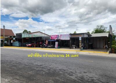 Street view of commercial area with multiple shops