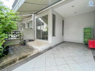 covered outdoor area with tiled floor