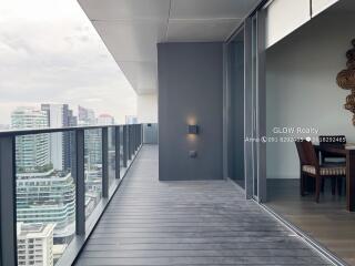 Modern high-rise apartment balcony with city view