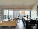 Modern living room with large windows and city view