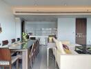 Modern open-concept living and dining area with kitchen