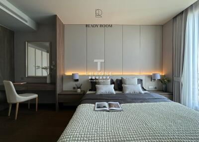 Modern bedroom with double bed and desk area