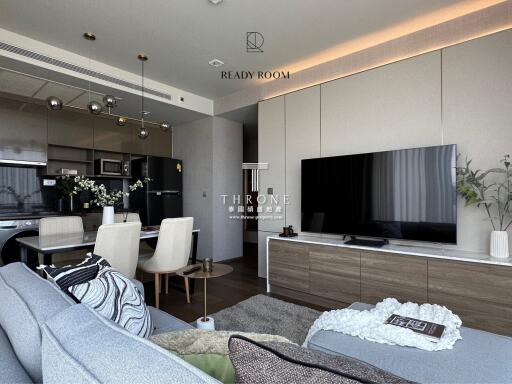 Modern living room with kitchen area