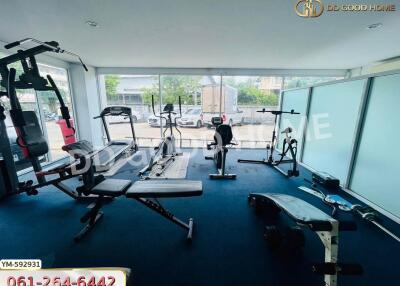 Well-equipped fitness room with various exercise machines
