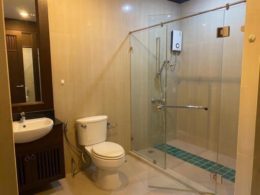 Modern bathroom with glass shower enclosure