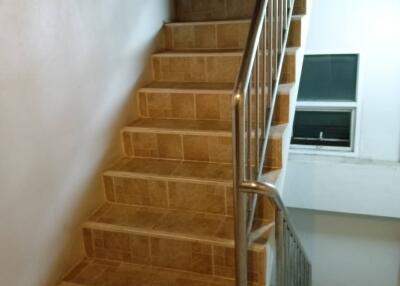 Indoor staircase with metal railing