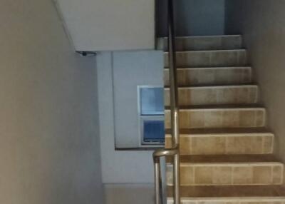 Staircase with metal railing