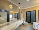 Modern bathroom with dual sink and large bathtub