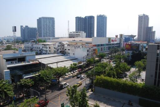 Cityscape view with high-rise buildings and commercial area