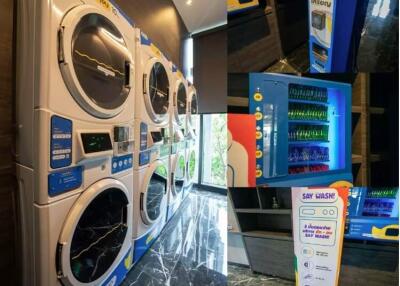 Apartment building laundry room with multiple washers and vending machines