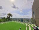 Rooftop area with a city view