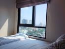 Bedroom with a large window view