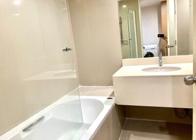 Modern bathroom with bathtub and sink