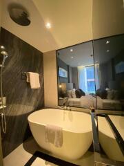 Modern bathroom with bathtub and shower