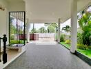 spacious outdoor patio with garden view