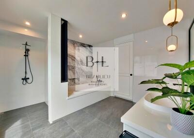 Modern bathroom with walk-in shower and stylish decor