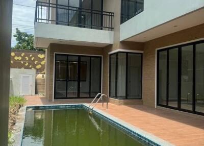 Modern two-story house with outdoor swimming pool