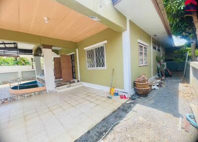 Outdoor living area with patio and garden