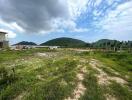 Open land with surrounding hills