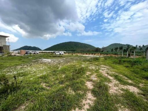 Open land with surrounding hills