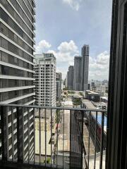 View of city buildings from balcony