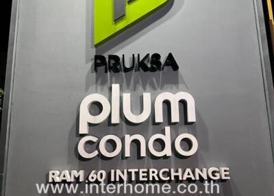 Entrance signage of Plum Condo Ram 60 Interchange