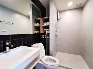 Modern bathroom with shower and vanity