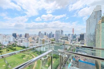 Stunning balcony view of the city skyline and golf course