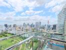 Stunning balcony view of the city skyline and golf course