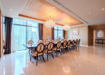 Elegant dining room with large table and chandelier