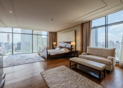 Spacious bedroom with panoramic city views