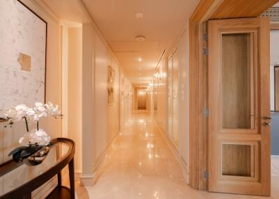 Elegant hallway with decorative table and artwork