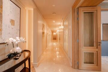 Elegant hallway with decorative table and artwork