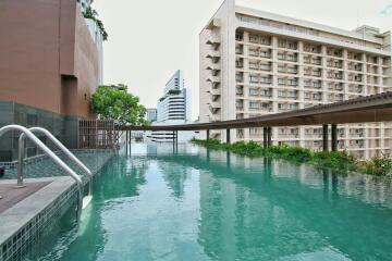 Rooftop pool area with city views