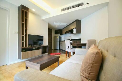 Modern living area with open-plan kitchen