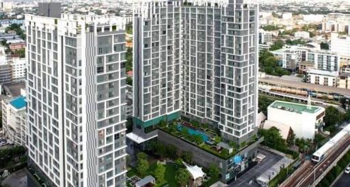 Aerial view of modern residential high-rise buildings with outdoor amenities