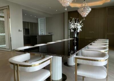 Modern dining room with elegant furniture and chandelier lighting