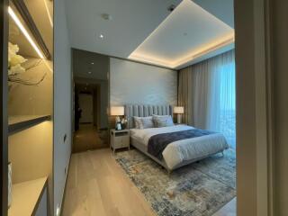 Modern bedroom with large window and stylish decor