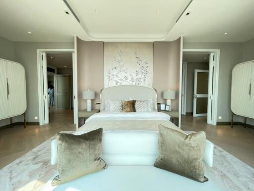 Spacious and luxurious bedroom with large bed and elegant decor