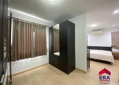 Bedroom with wardrobe and bed