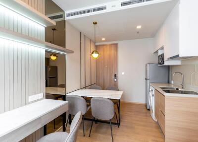 Modern kitchen and dining area with sleek design