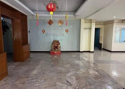 Spacious living room with decorative lanterns and shrine