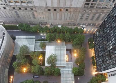 Aerial view of modern residential buildings with a landscaped courtyard