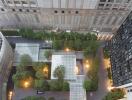 Aerial view of modern residential buildings with a landscaped courtyard