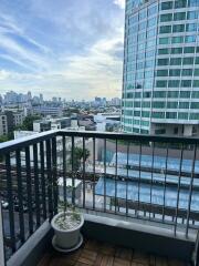 Balcony with city view and potted plant